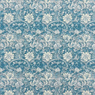 Floral velvet upholstery fabric in blue with ivory botanical pattern