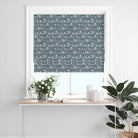 Woodland Toile Blue Roman blind showing a traditional country forest scene with deer, bears and birds