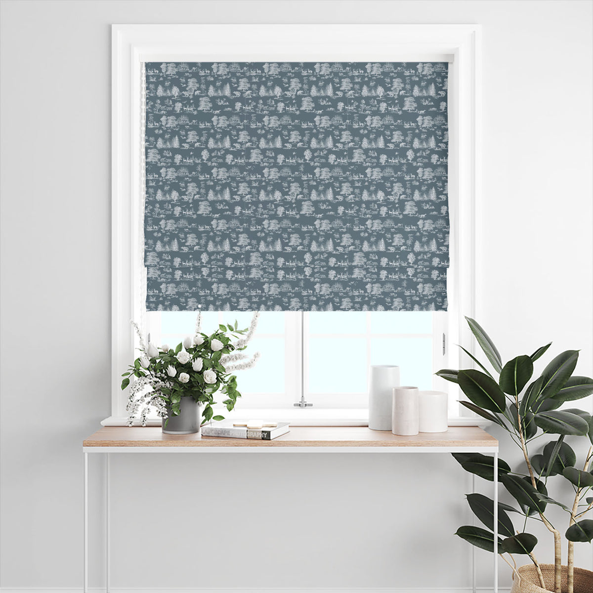 Woodland Toile Blue Roman blind showing a traditional country forest scene with deer, bears and birds