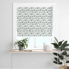 Woodland Toile Green and White Roman blind adding a light traditional woodland pattern to the window