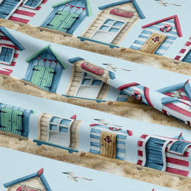 Nautical-themed Beach Huts Cotton Curtain Fabric in Blue, perfect for adding a coastal touch to your home decor