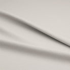 Blackout thermal curtain lining in ivory color, ideal for blocking light and regulating temperature in any room