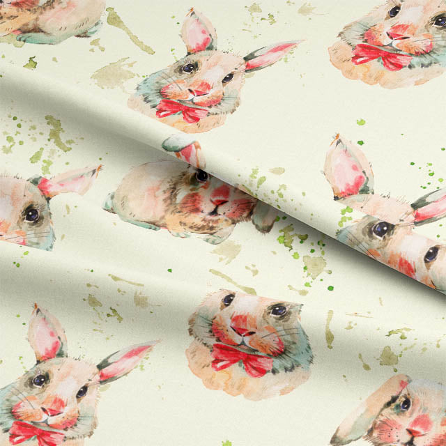 Close-up of Bunnies Cotton Fabric - Beige with intricate bunny pattern