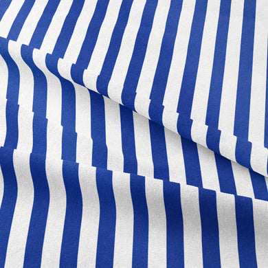 Close-up of royal blue cotton curtain fabric with candy stripe pattern