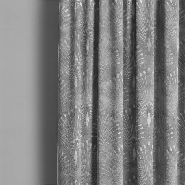 Beautifully draped Deco Plume Linen Curtain Fabric - Pewter in a stylish interior setting