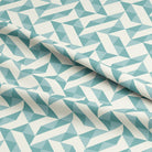 Close-up of Teal Curtain Fabric with Geometric Pattern