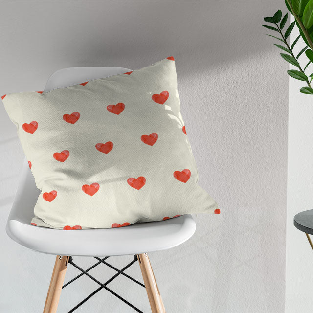 Red cotton fabric with adorable heart print, perfect for creating a cozy atmosphere
