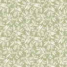 Flat lay of Oxford Leaf Green fabric showing repeating white leaf motif on sage background