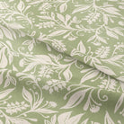Close-up of textured Oxford Cotton Curtain Fabric in vibrant green color