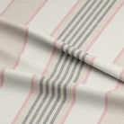 Luxurious and soft cotton curtain fabric in beautiful shade of pink, perfect for creating a cozy and inviting atmosphere