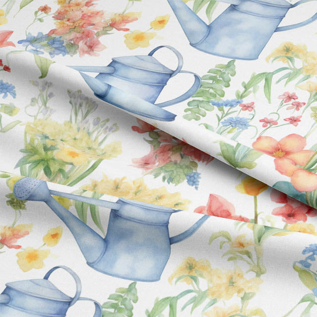 Close-up of blue fabric with watering cans print for curtains