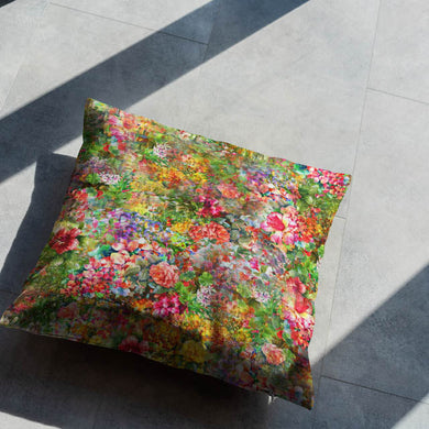  Wisley Cotton Curtain Fabric - Summer swatch displayed against a window, showcasing its light-filtering properties